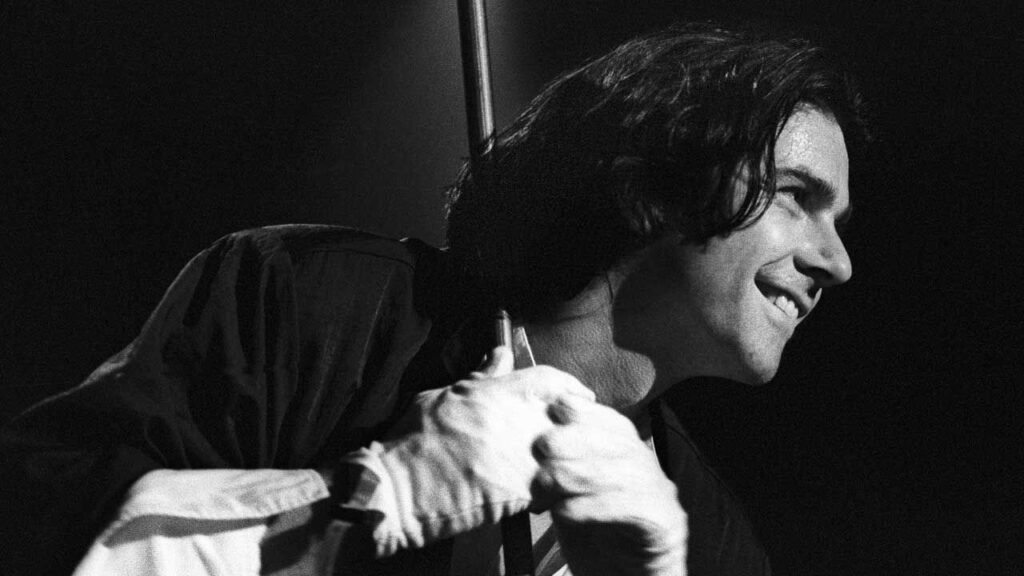 Steve Hogarth performing with Marillion on stage in 1989