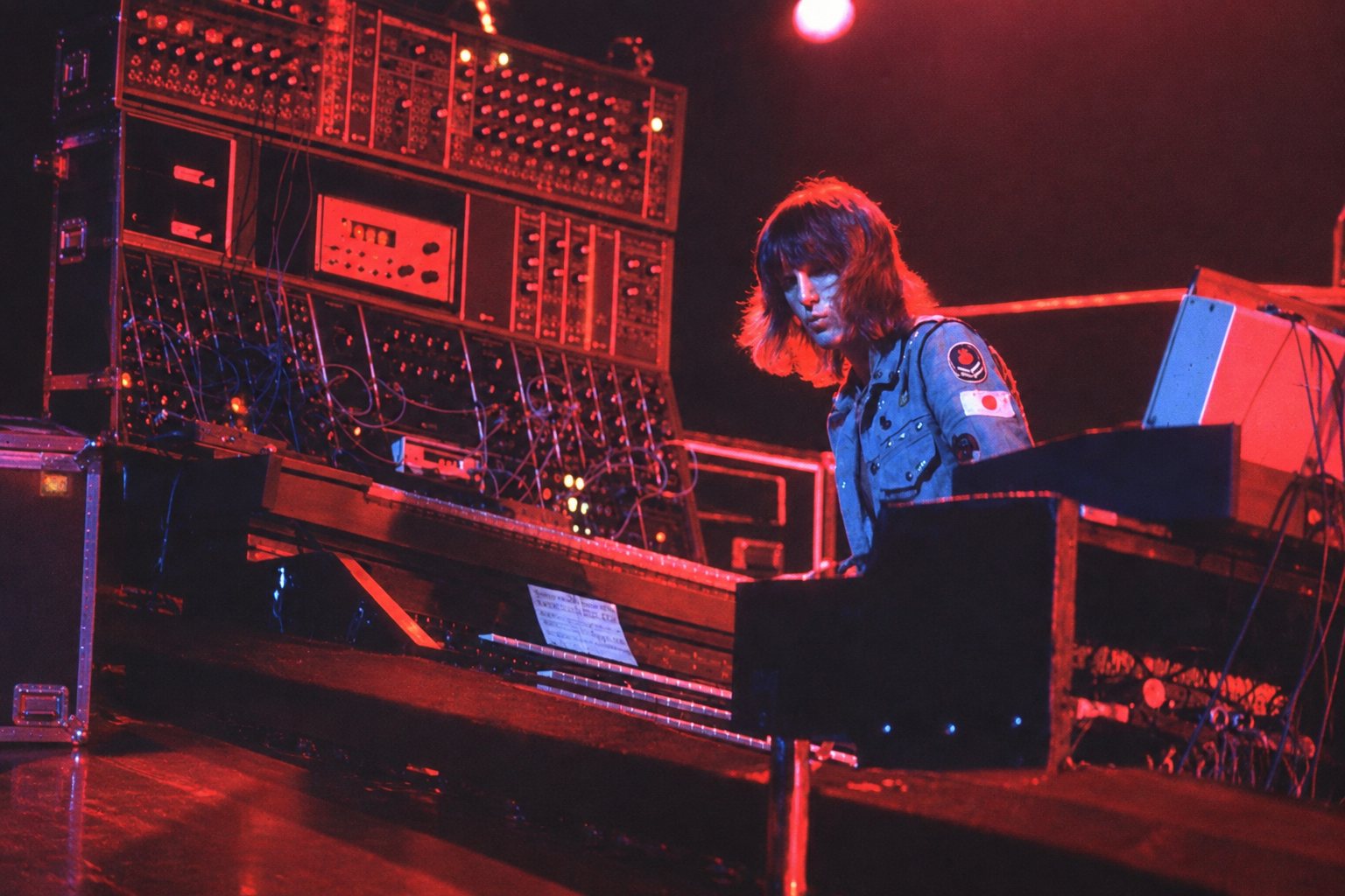 Keith Emerson performing with a Moog synthesizer on stage in the 1970s
